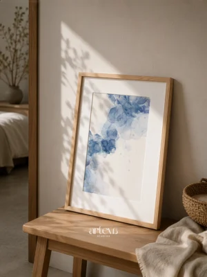 Blue abstract ink wall art with soft fluid blue forms on a clean white background